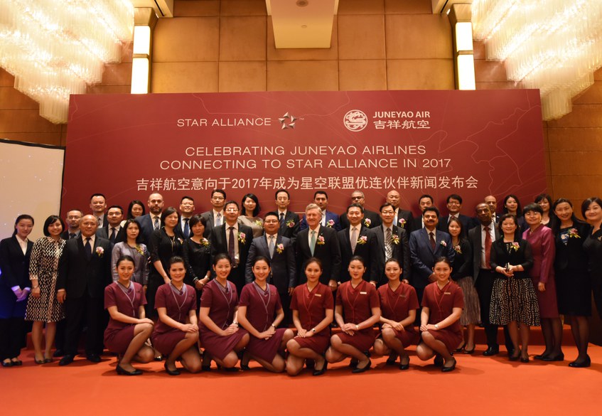 Group photo with Juneyao staff in uniform