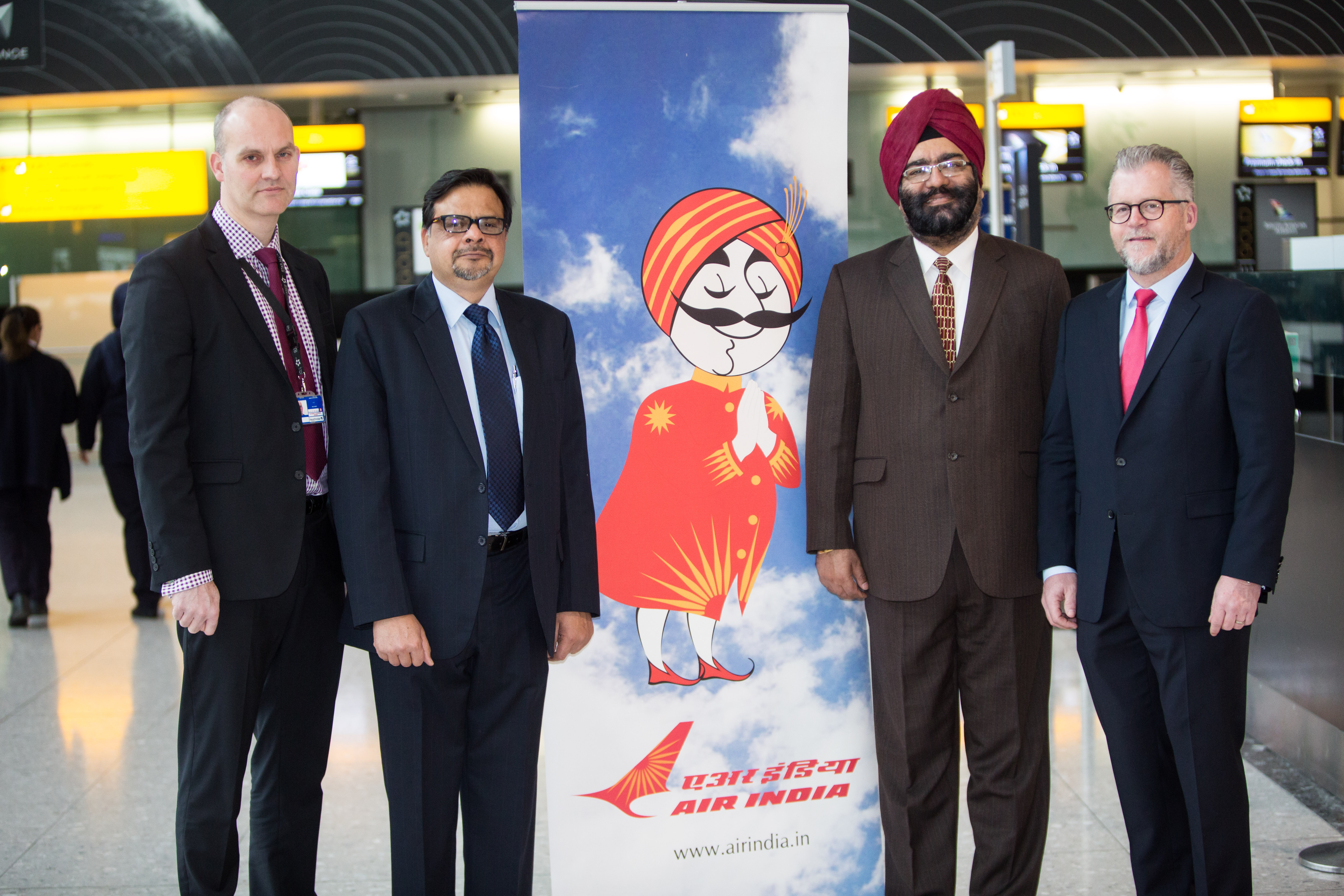 Air India and Star Alliance management celebrating Air India's move to Terminal 2 at Heathrow