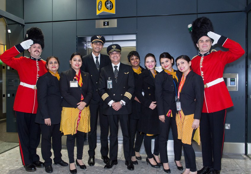 Air India Crew given traditional English welcome to Heathrow Terminal 2 (p)
