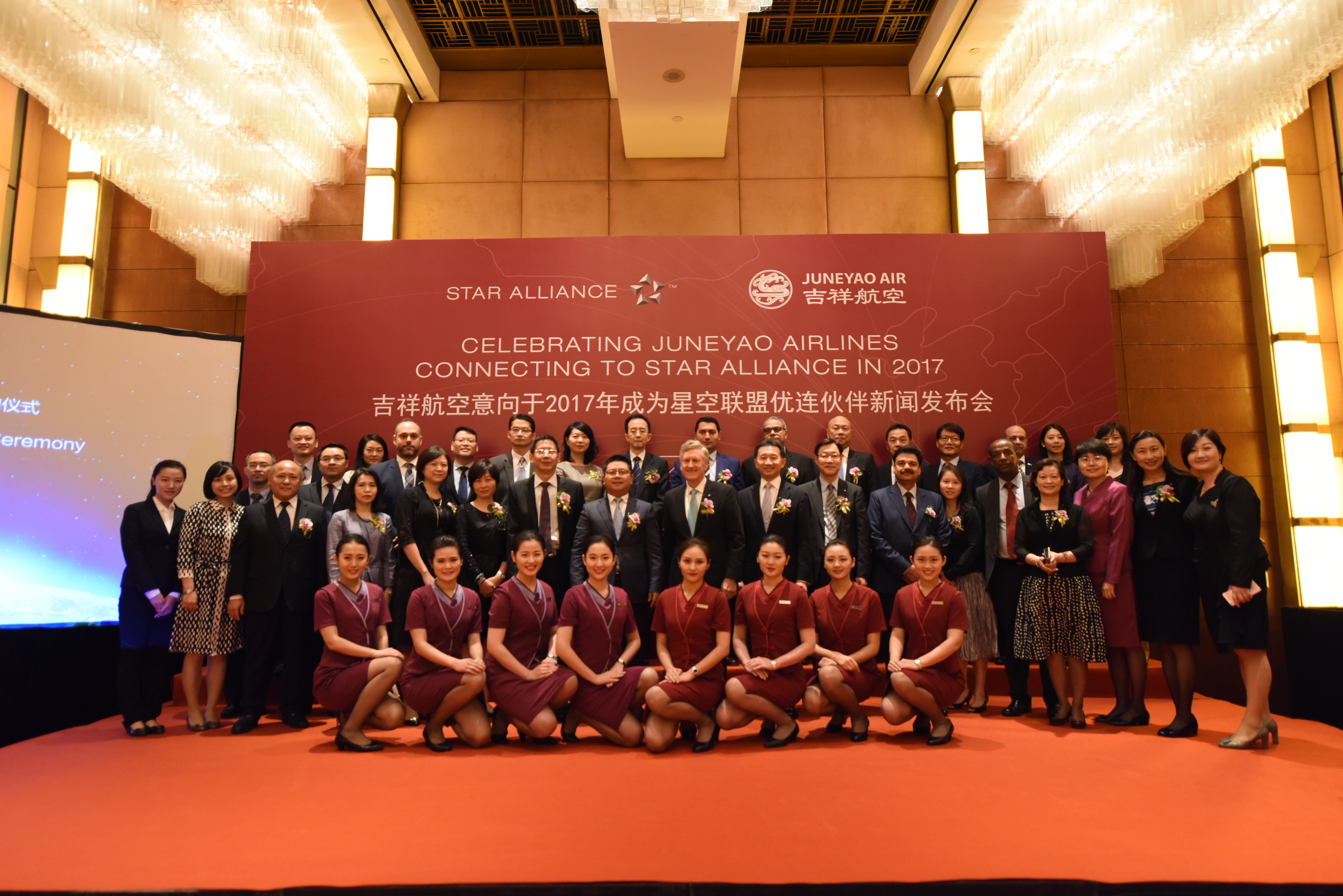 Group photo with Juneyao staff in uniform